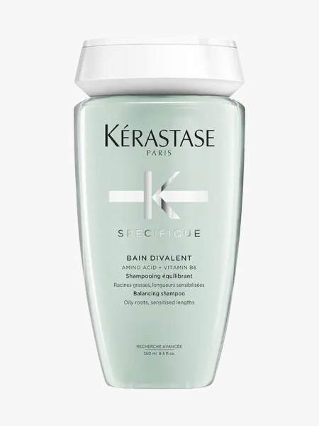 Kérastase Specifique Bain Divalent Shampoo in branded component on a light gray background